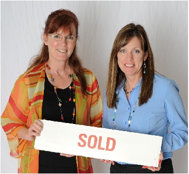 BevVan and Shellie w sold sign