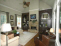Family Room with built ins, view to backyard and a gorgeous fireplace no image