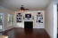 Magnificent open floor plan. Kitchen open to this fabulous family room that has french doors that lead to the salt water Pebble Tec pool and covered brick patio! no image