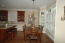 Large breakfast area with lots of natural light looks onto the professionally landscaped and maintained gardens. no image