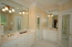 Seperate his/hers vanities and a whirlpool tub in the master bath no image
