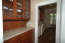 Solid cherry butler's pantry in between kitchen and dining room makes entertaining a must in this home! no image