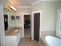 Master bath with double vanity and seperate tub and shower no image