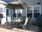 Relax on this stone paver patio overlooking fenced back yard with heavy tree border. Great Privacy. no image
