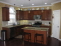 Granite, Stainless Stell appliances and Rich 6" Cherry finish Floors. no image