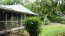 Back yard with lava rock lanai and built-in BBQ no image